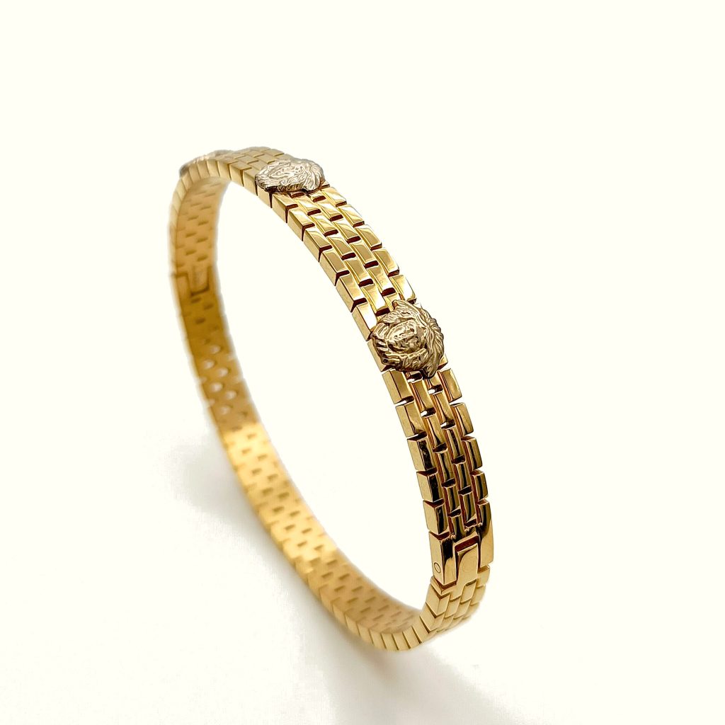 Bracciale rigido con meduse in acciaio dorato